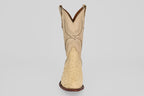 The Exotic Full Quilt Ostrich - Bone features a single genuine ostrich leather cowboy boot in beige with a round toe, decorative shaft stitching, and dark brown sole, displayed facing forward on a plain light background.