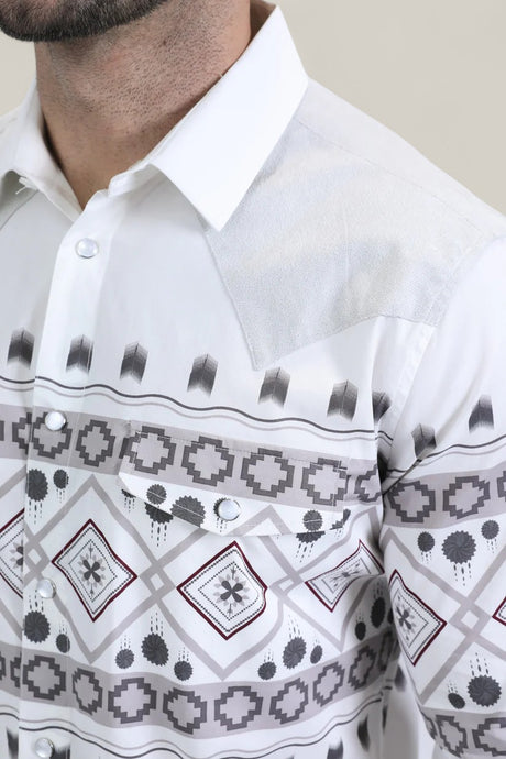 A man wears the Mens Western Modern Fit Cotton/Spandex Long Sleeve White Shirt with Snaps (WPL10751), featuring a modern fit, pointed collar, chest pocket, and geometric maroon and gray patterns across the chest and sleeves.